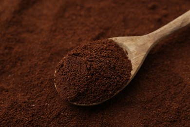 Photo of Instant coffee powder and spoon, closeup view