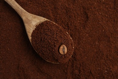Photo of Instant coffee powder, bean and spoon, top view. Space for text