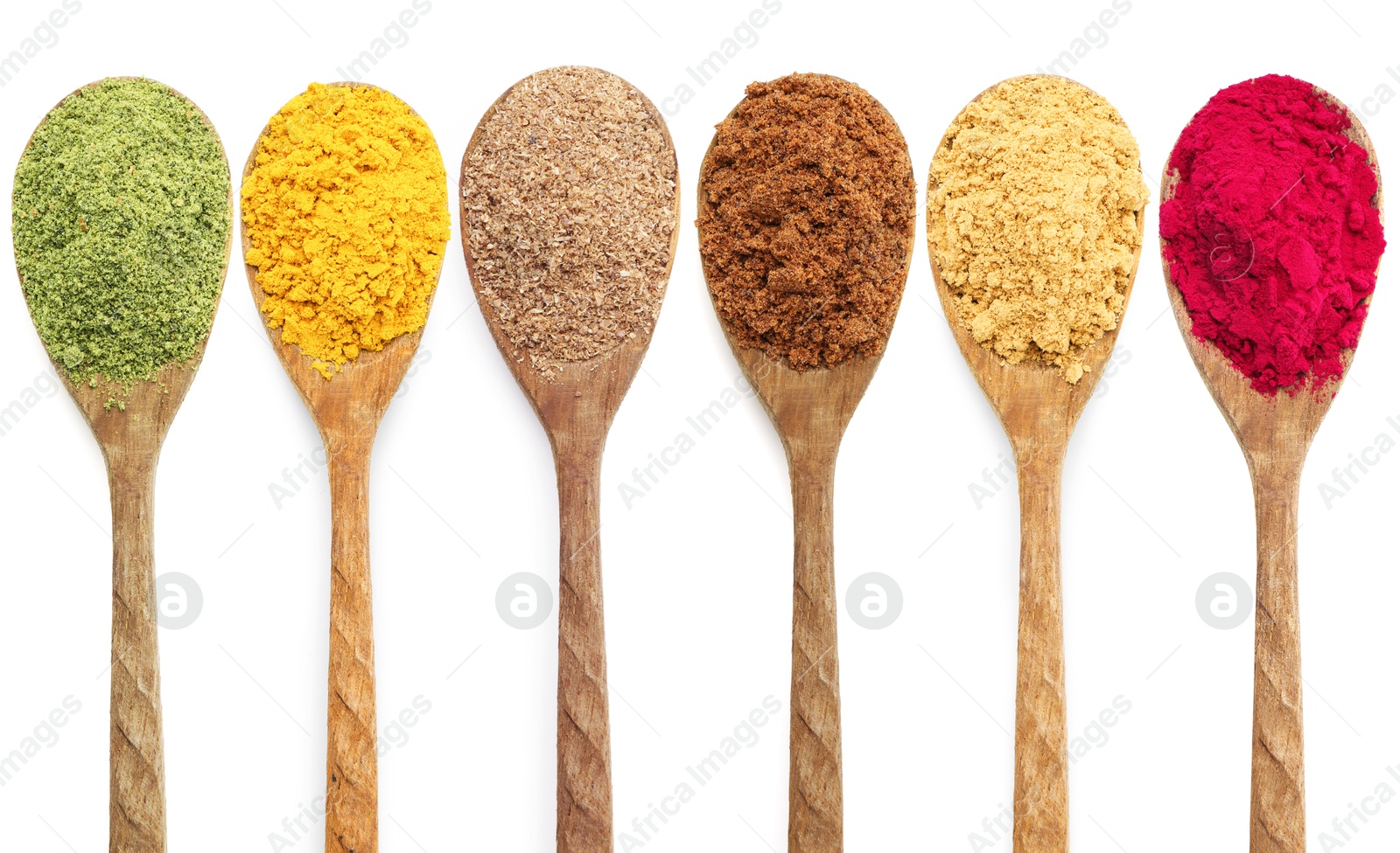 Different superfood powders in wooden spoons on white background, collage. Top view Image of Different superfood powders in wooden spoons on white background, collage. Top view