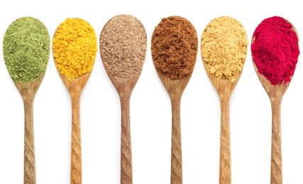 Image of Different superfood powders in wooden spoons on white background, collage. Top view