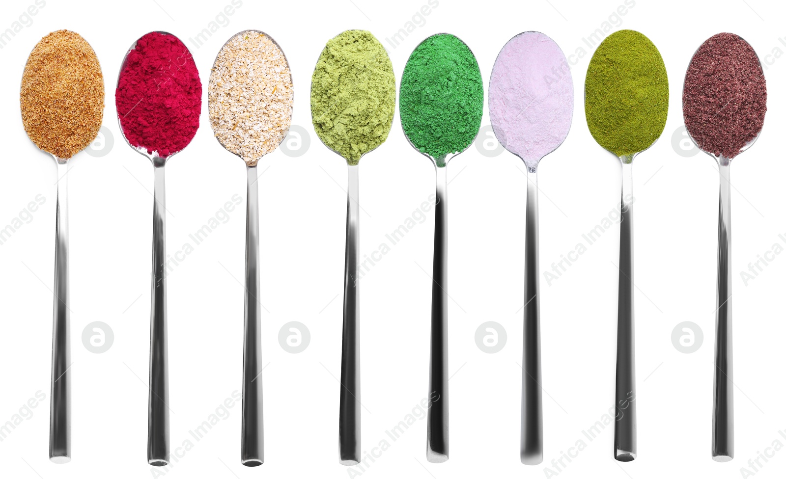Different superfood powders in spoons on white background, collage. Top view Image of Different superfood powders in spoons on white background, collage. Top view