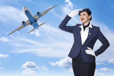 Image of Smiling stewardess against blue sky with plane and clouds