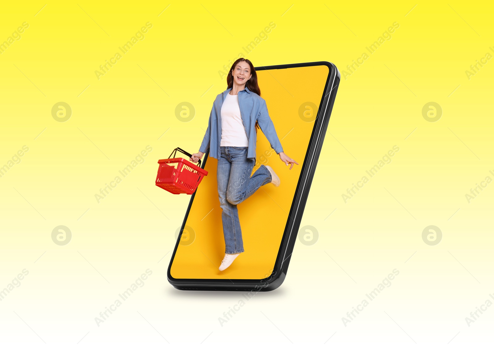 Happy woman with shopping basket jumping out of mobile phone on yellow gradient background. Online ordering Image of Happy woman with shopping basket jumping out of mobile phone on yellow gradient background. Online ordering