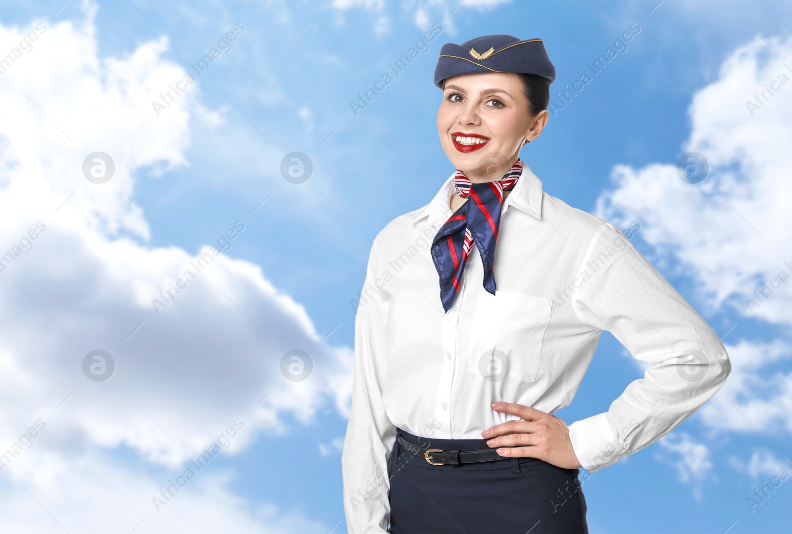 Image of Smiling stewardess against blue sky with clouds