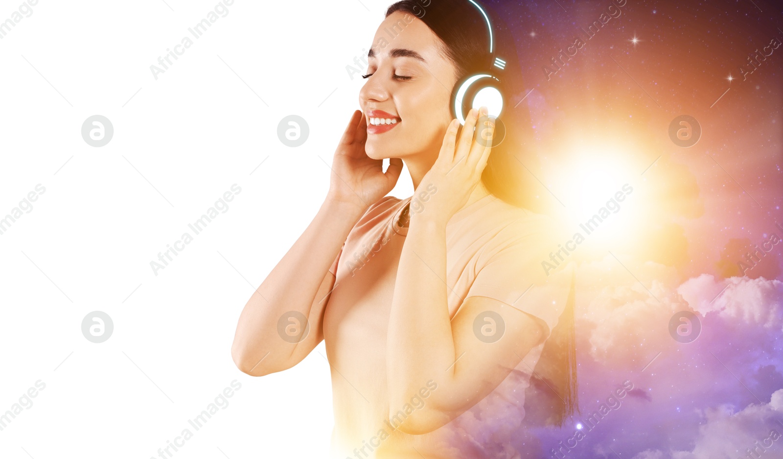 Young woman listening to music with headphones on white background, double exposure with universe Image of Young woman listening to music with headphones on white background, double exposure with universe