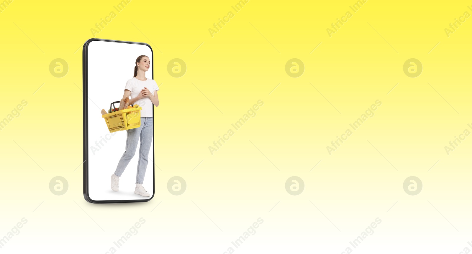 Happy woman with shopping basket walking out of mobile phone on yellow gradient background, banner design. Online order Image of Happy woman with shopping basket walking out of mobile phone on yellow gradient background, banner design. Online order