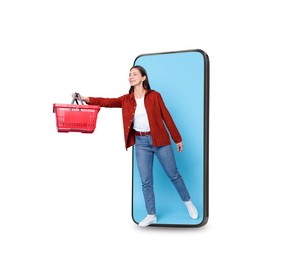 Image of Happy woman with shopping basket walking out of mobile phone on white background. Online ordering
