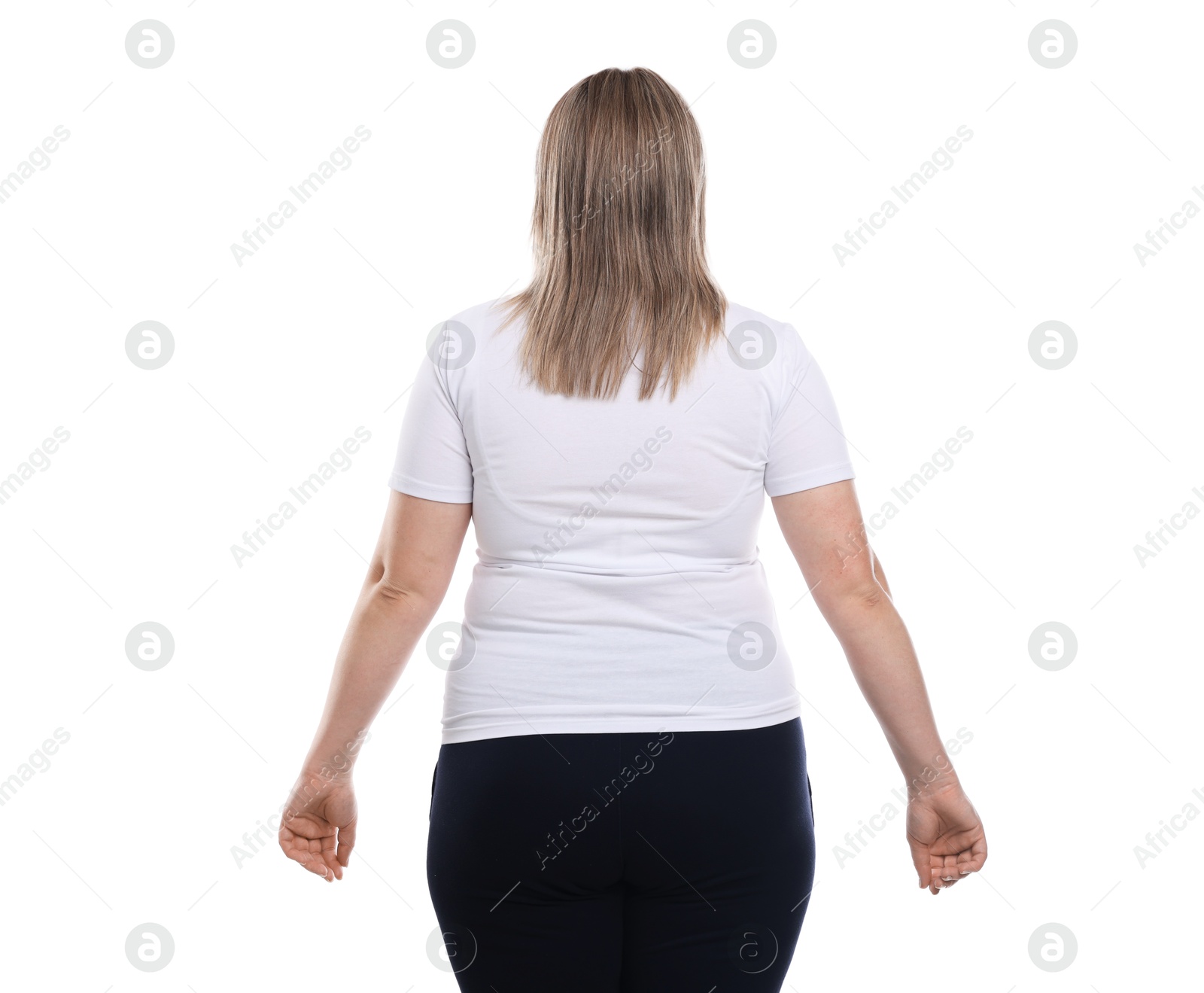 Weight loss. Plus size woman on white background, back view Photo of Weight loss. Plus size woman on white background, back view