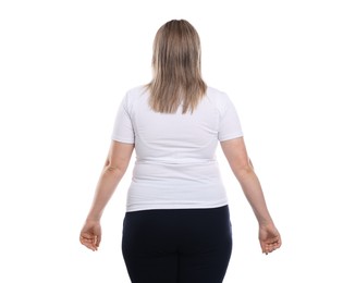Photo of Weight loss. Plus size woman on white background, back view