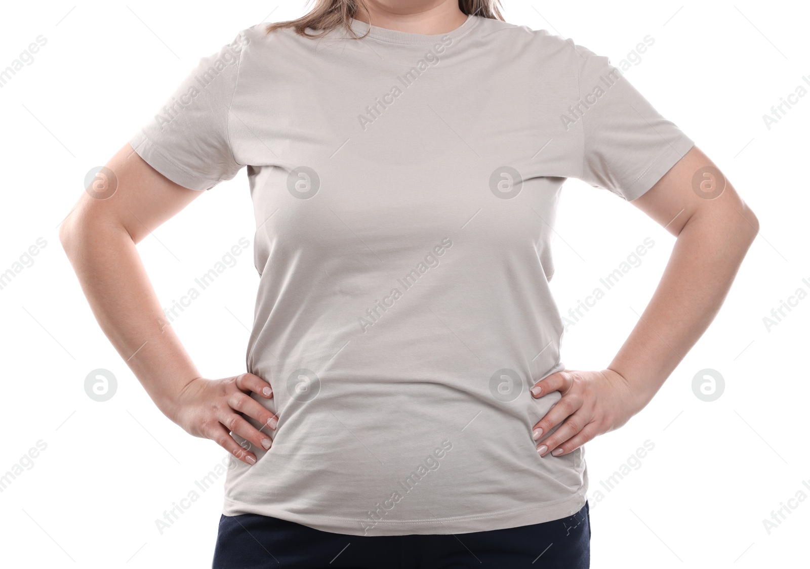 Weight loss. Plus size woman on white background, closeup Photo of Weight loss. Plus size woman on white background, closeup