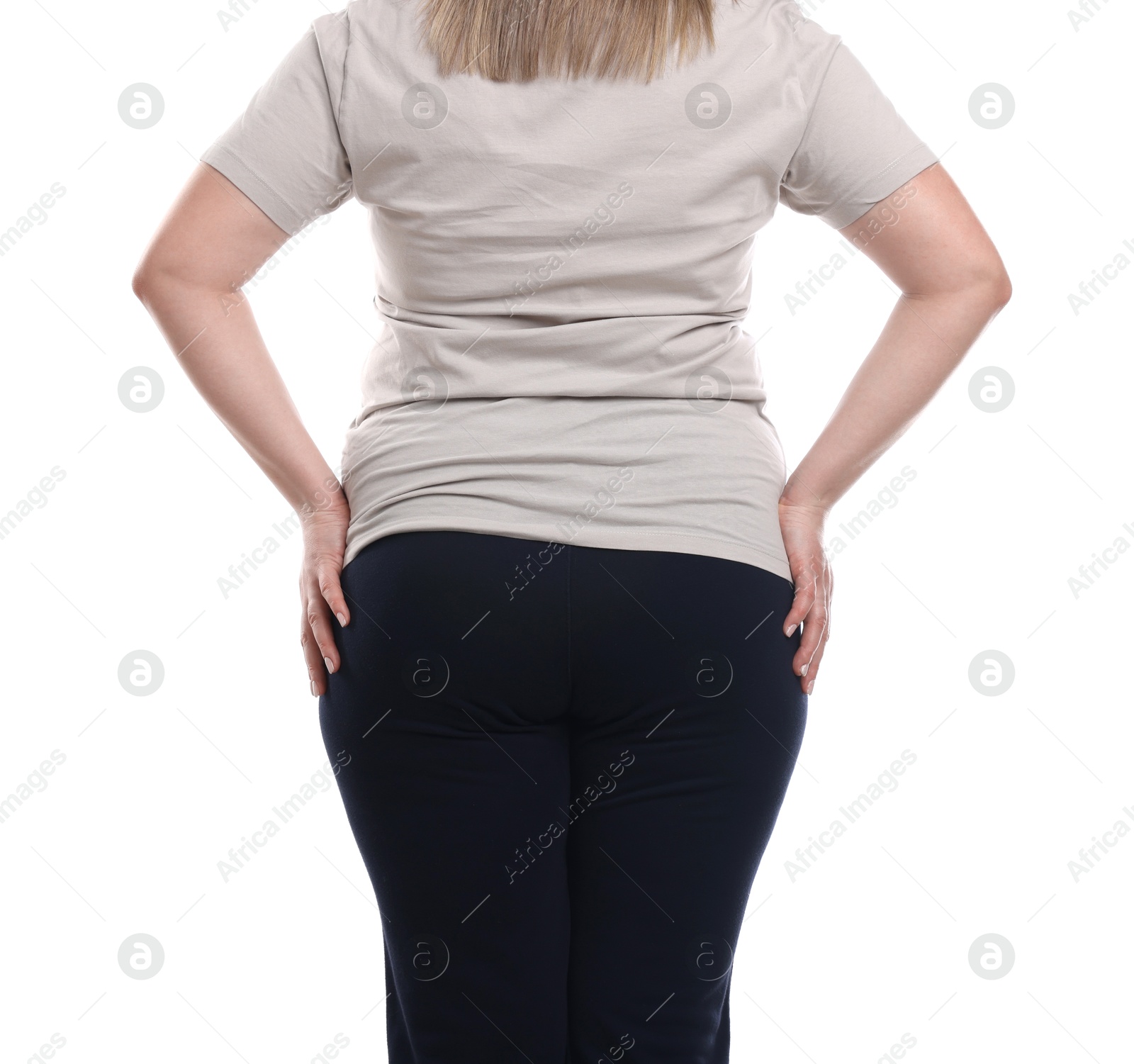 Weight loss. Plus size woman on white background, closeup Photo of Weight loss. Plus size woman on white background, closeup