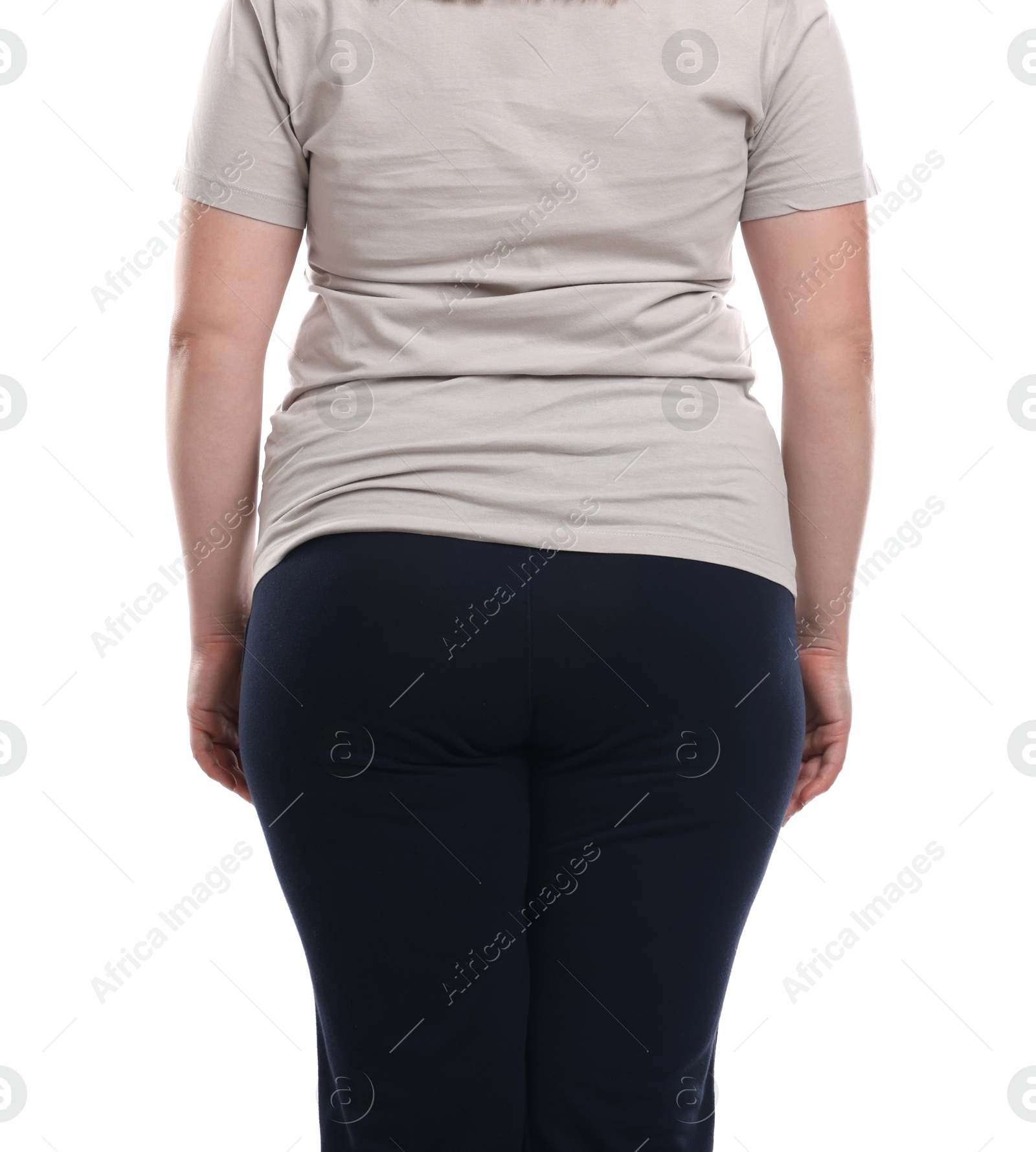 Weight loss. Plus size woman on white background, closeup Photo of Weight loss. Plus size woman on white background, closeup