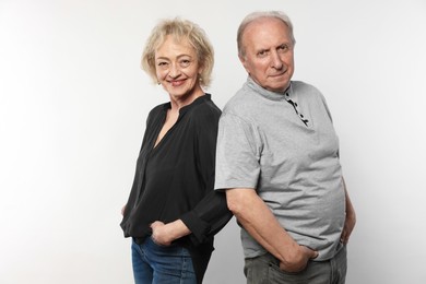 Photo of Portrait of lovely senior couple on white background