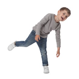 Photo of Happy little boy dancing on white background