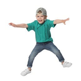 Photo of Happy little boy dancing on white background