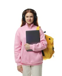 Photo of Teenage girl with laptop, headphones and backpack on white background