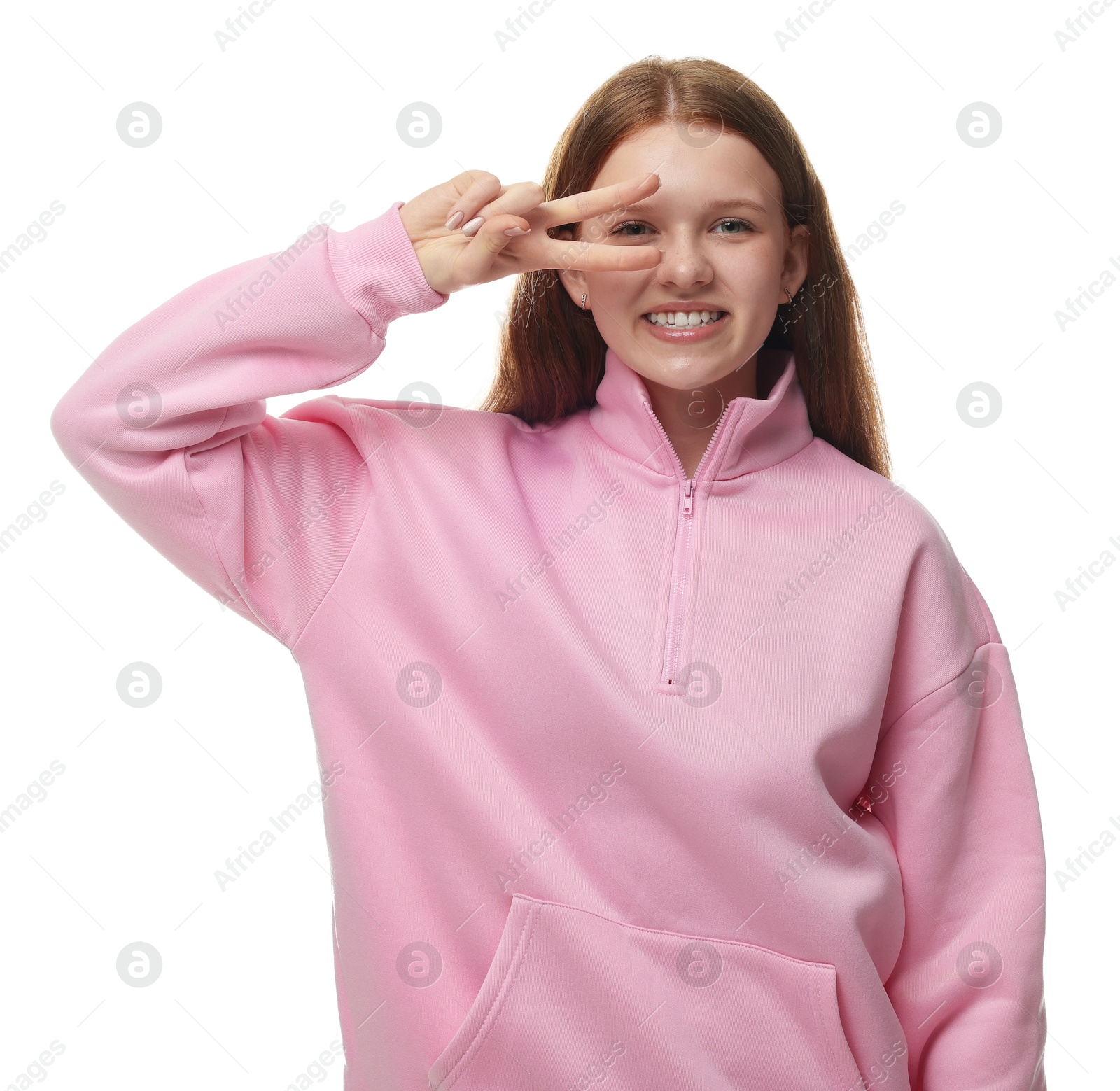 Happy teenage girl posing on white background Photo of Happy teenage girl posing on white background
