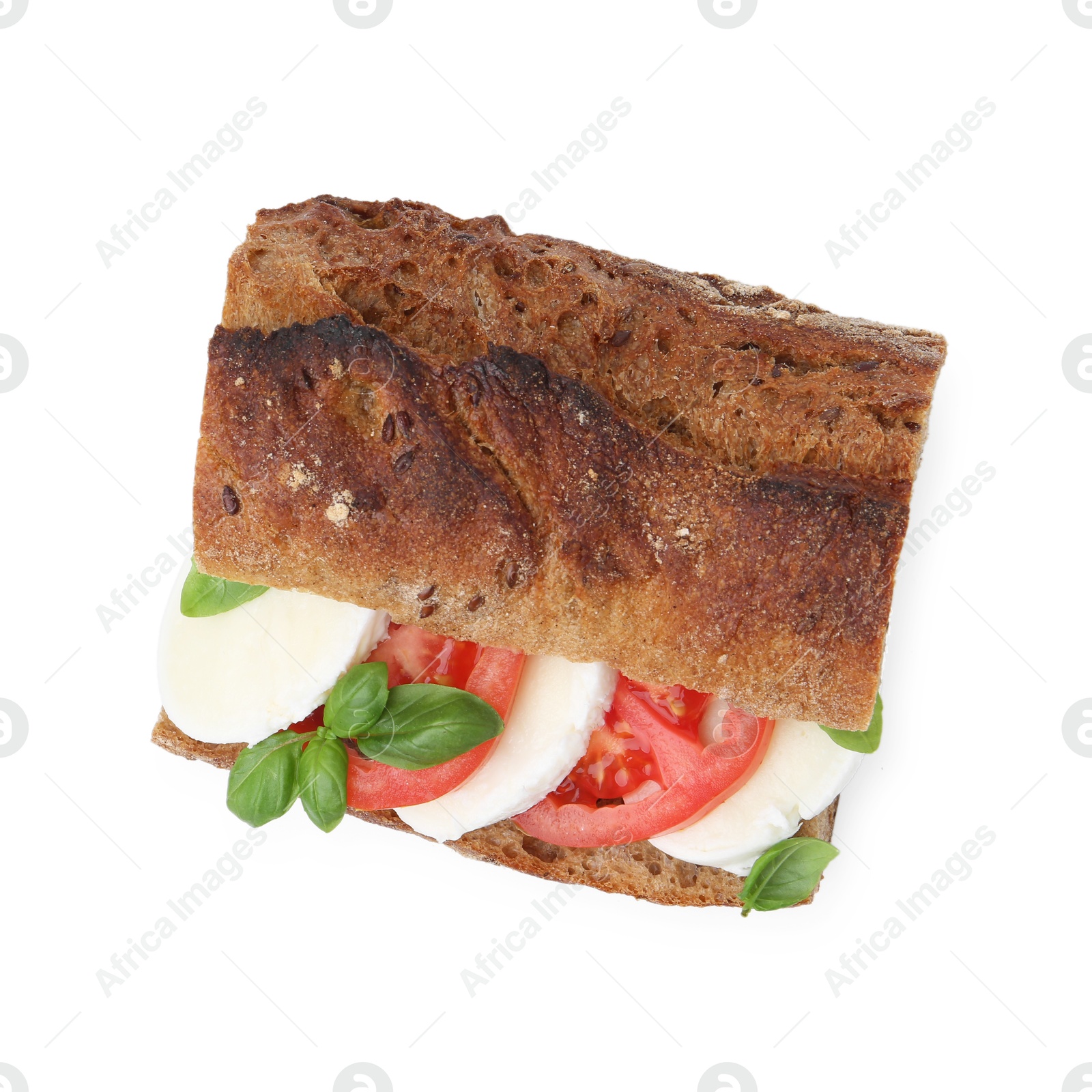 Tasty sandwich with mozzarella cheese, tomatoes and basil isolated on white, top view Photo of Tasty sandwich with mozzarella cheese, tomatoes and basil isolated on white, top view