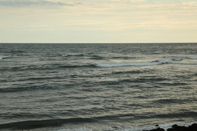 Photo of View of wavy sea under beautiful sky