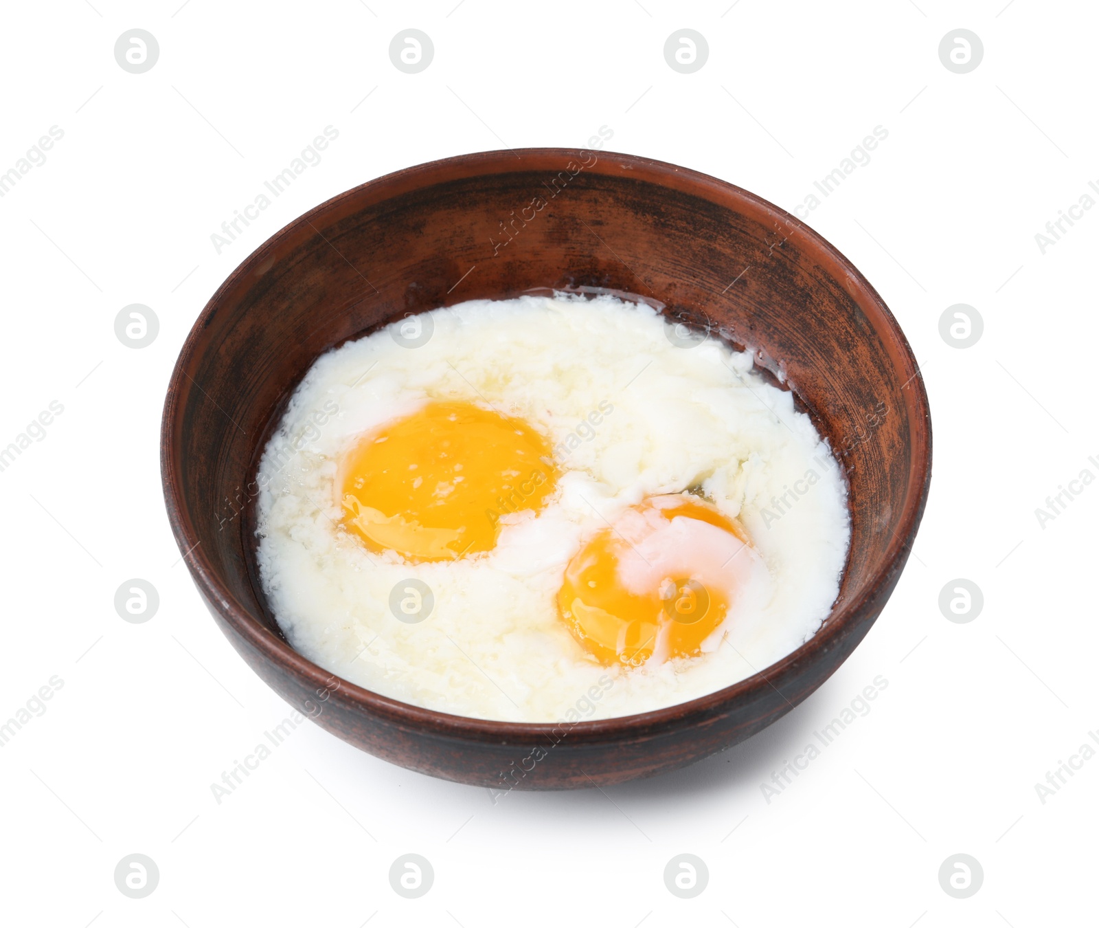 Half-boiled eggs in bowl isolated on white Photo of Half-boiled eggs in bowl isolated on white