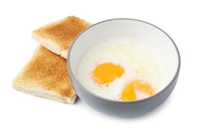 Photo of Half-boiled eggs in bowl and toasted bread isolated on white