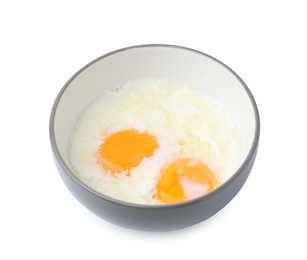 Photo of Half-boiled eggs in bowl isolated on white