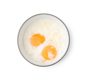 Photo of Half-boiled eggs in bowl isolated on white, top view