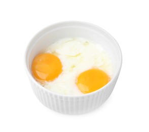 Photo of Half-boiled eggs in bowl isolated on white