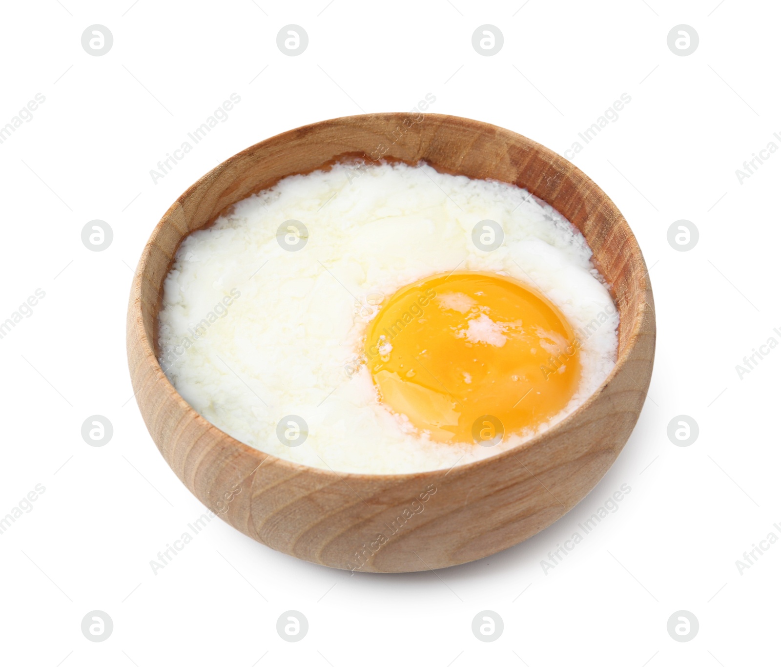 Half-boiled egg in bowl isolated on white Photo of Half-boiled egg in bowl isolated on white