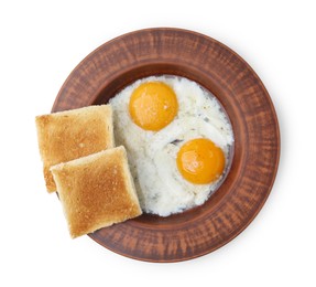 Photo of Half-boiled eggs in plate and toasted bread isolated on white, top view