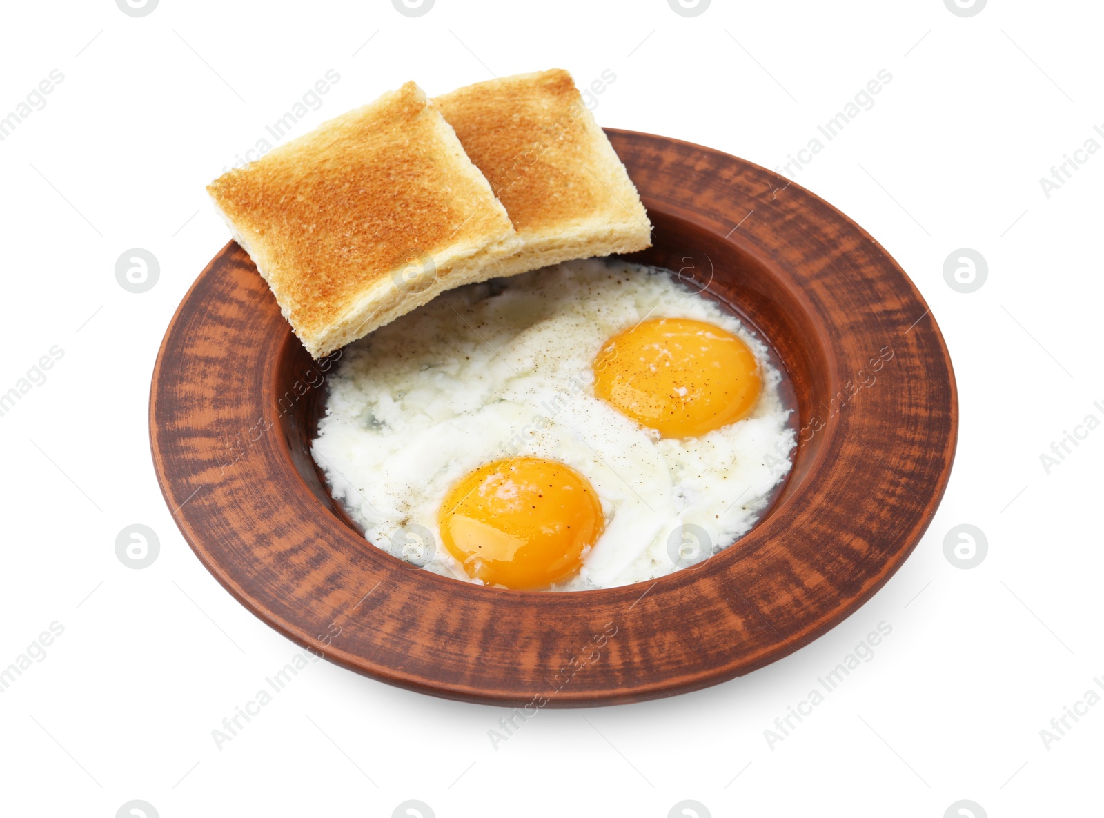 Half-boiled eggs in plate and toasted bread isolated on white Photo of Half-boiled eggs in plate and toasted bread isolated on white