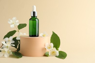 Photo of Cosmetic product and jasmine flowers on beige background. Space for text