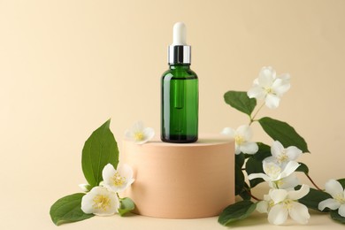 Photo of Cosmetic product and jasmine flowers on beige background