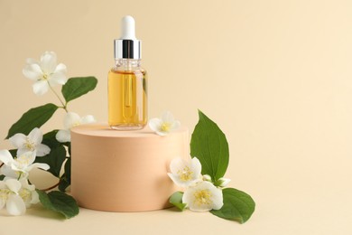 Photo of Cosmetic product and jasmine flowers on beige background. Space for text