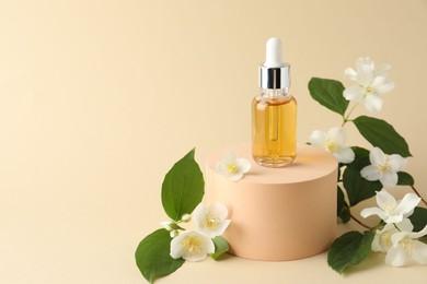 Photo of Cosmetic product and jasmine flowers on beige background. Space for text