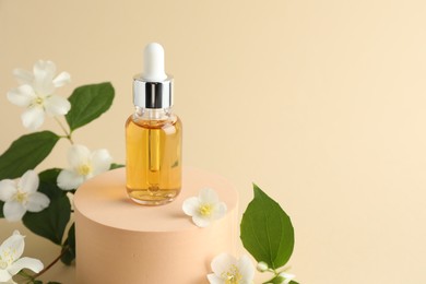 Photo of Cosmetic product and jasmine flowers on beige background, closeup. Space for text