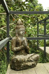 Photo of Bali, Indonesia - May 24, 2025: Beautiful Buddha statue outdoors