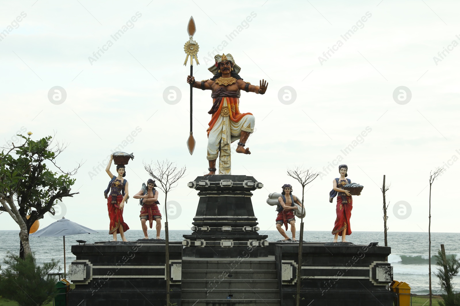 Bali, Indonesia - May 27, 2025: Different statues on beach near sea Photo of Bali, Indonesia - May 27, 2025: Different statues on beach near sea