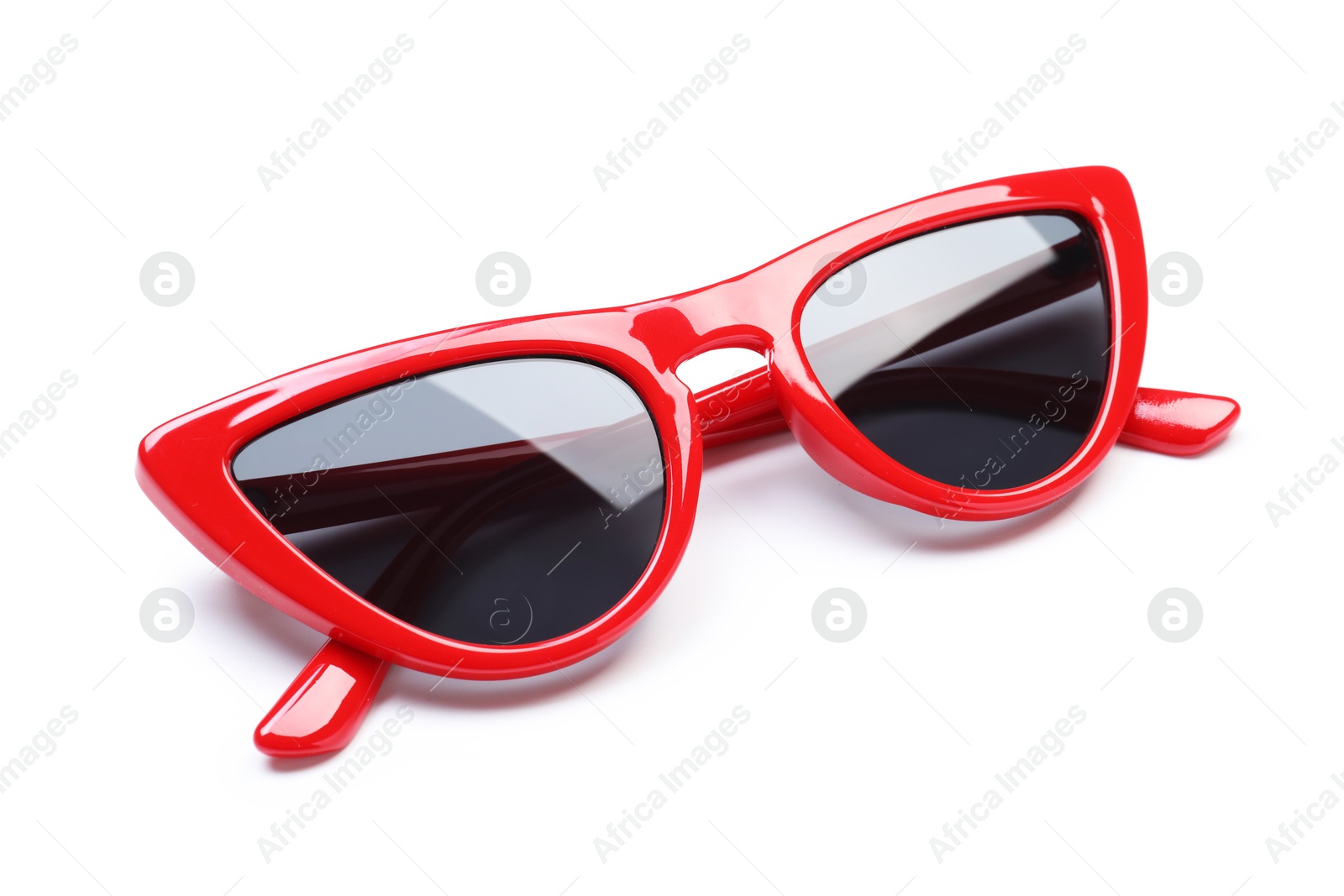 Stylish red sunglasses isolated on white. Beach accessory Photo of Stylish red sunglasses isolated on white. Beach accessory
