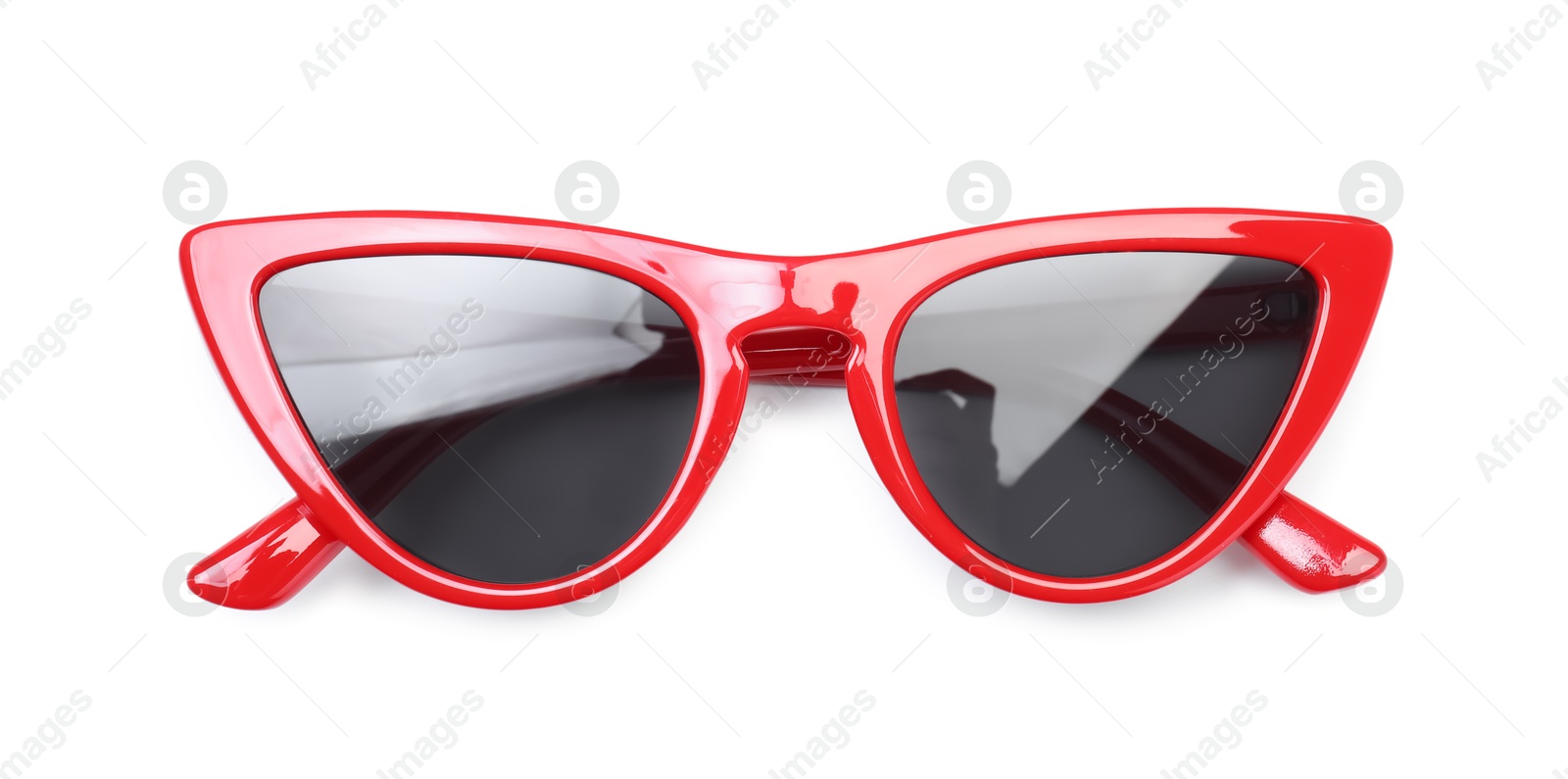 Stylish red sunglasses isolated on white, top view. Beach accessory Photo of Stylish red sunglasses isolated on white, top view. Beach accessory