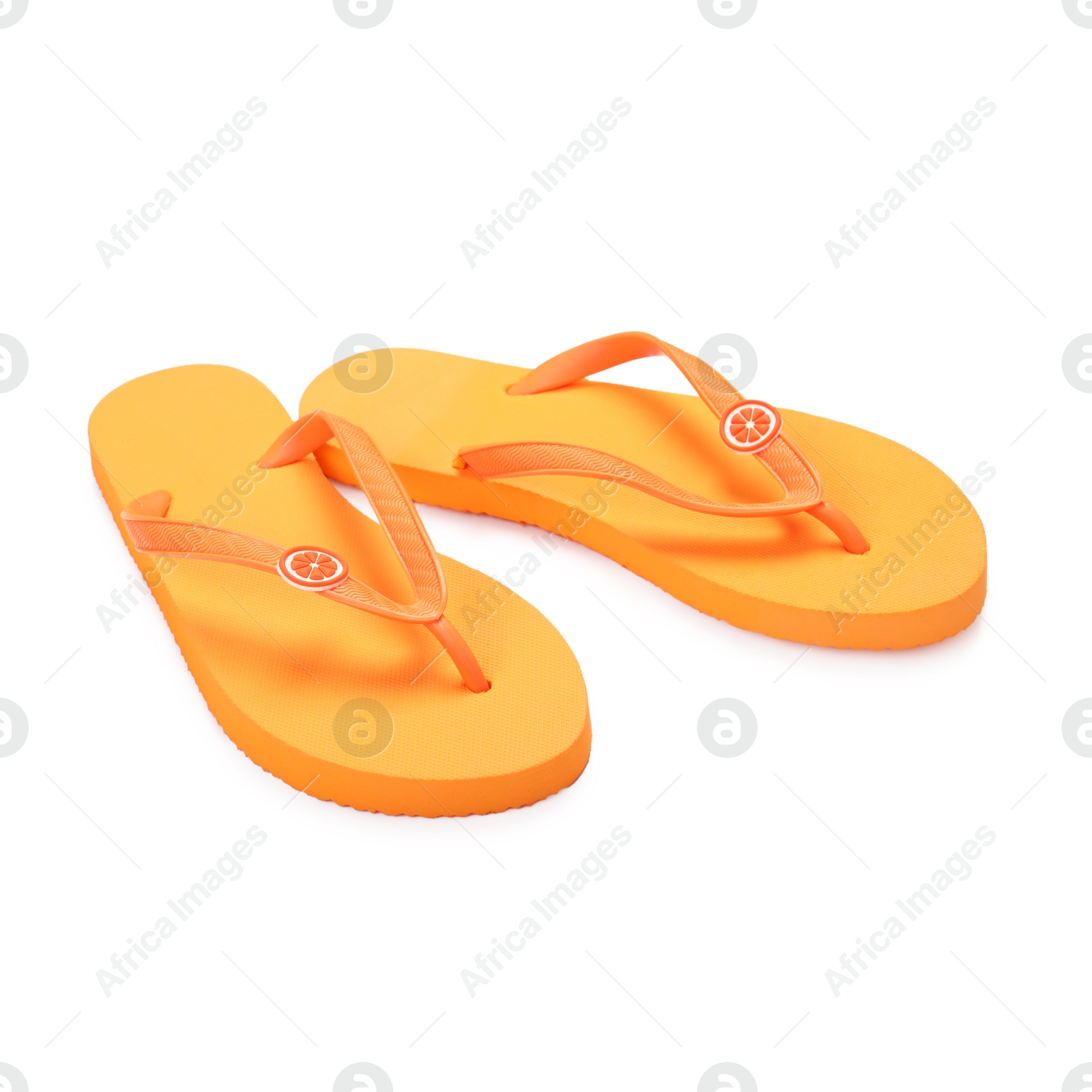 Stylish orange flip flops isolated on white. Beach accessory Photo of Stylish orange flip flops isolated on white. Beach accessory