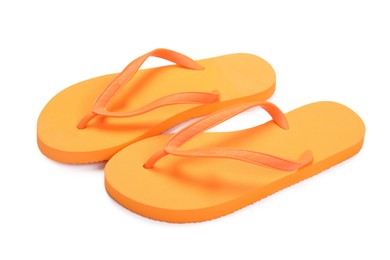 Photo of Stylish orange flip flops isolated on white. Beach accessory
