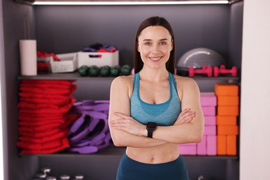 Photo of Beautiful woman wearing sportswear in fitness studio