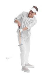 Image of Golfer hitting ball with club on white background