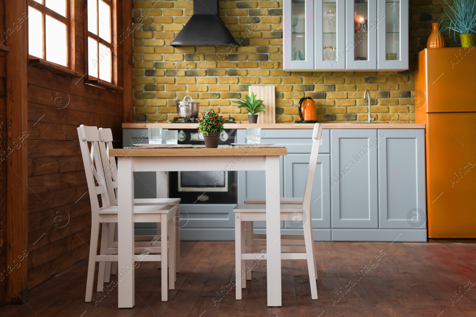 Dining table and chairs in kitchen. Interior design Image of Dining table and chairs in kitchen. Interior design
