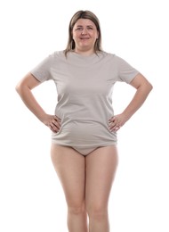 Photo of Weight loss. Plus size woman on white background