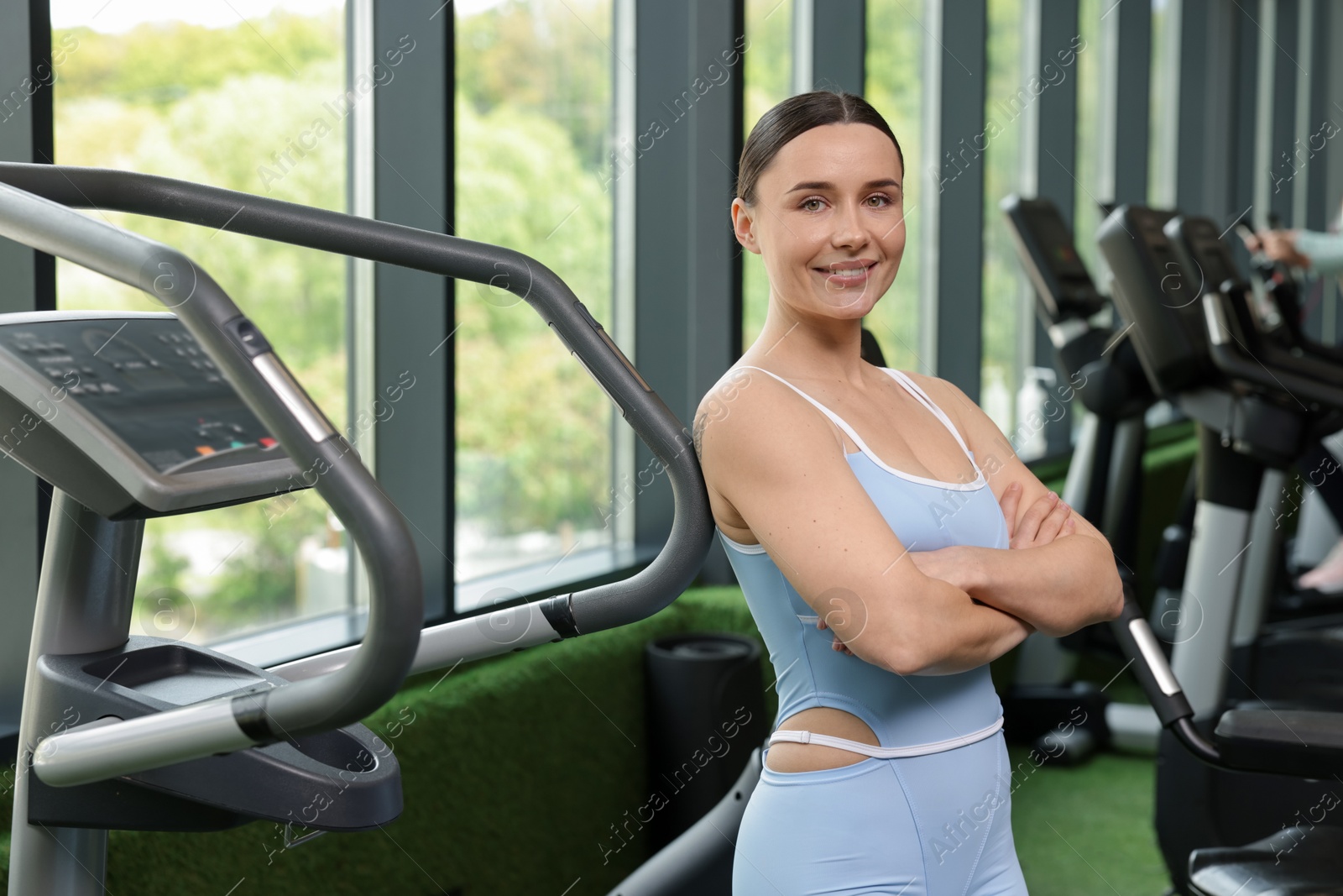 Portrait of professional personal trainer in sport center Photo of Portrait of professional personal trainer in sport center