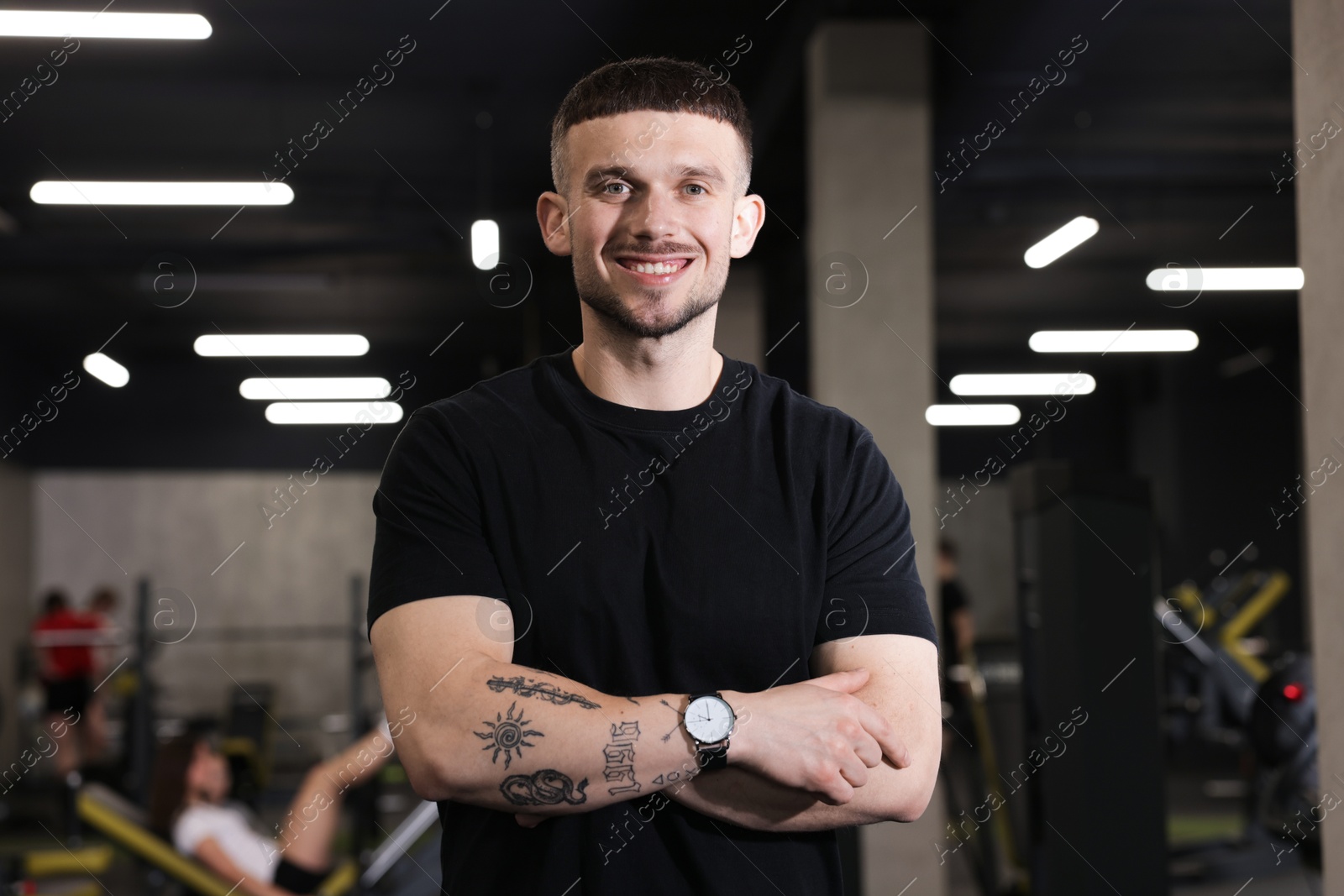 Portrait of professional personal trainer in sport center Photo of Portrait of professional personal trainer in sport center
