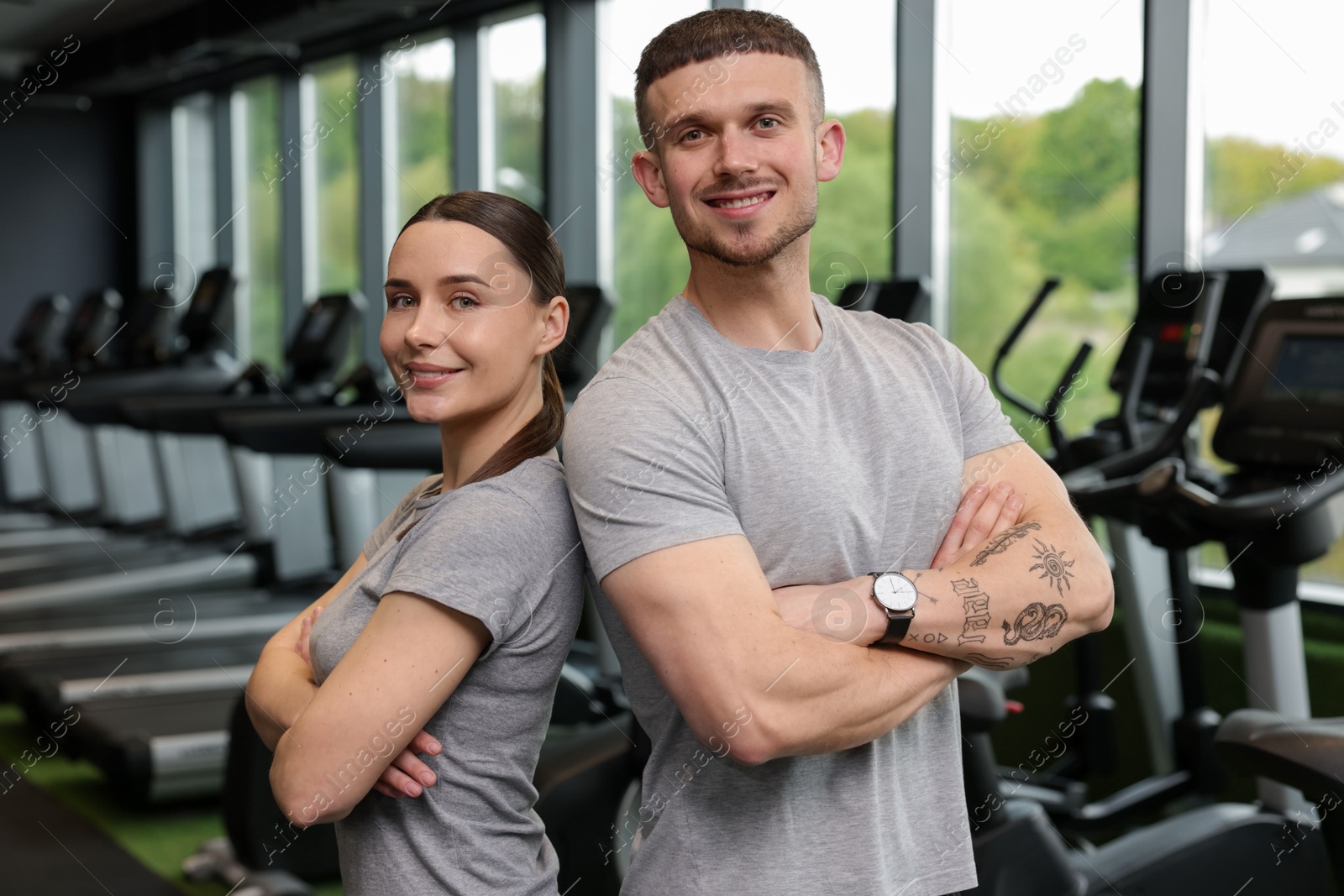 Portrait of personal trainers in sport center Photo of Portrait of personal trainers in sport center