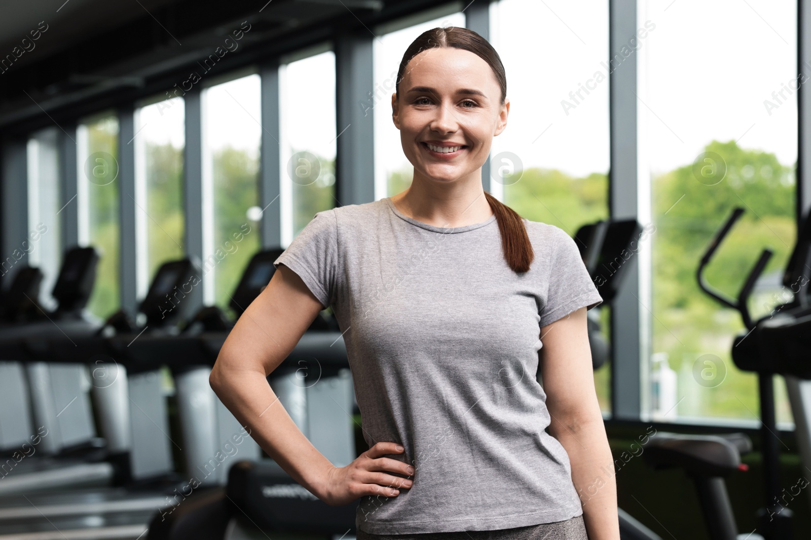 Portrait of personal trainer in sport center Photo of Portrait of personal trainer in sport center